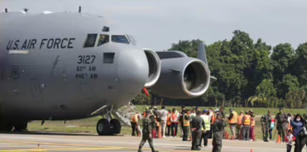 13 children, 25 women, total 104; Arrived in India by American military flight for 40 hours