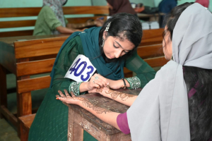  Interesting henna and clay sculpting at the Kerala festival venue