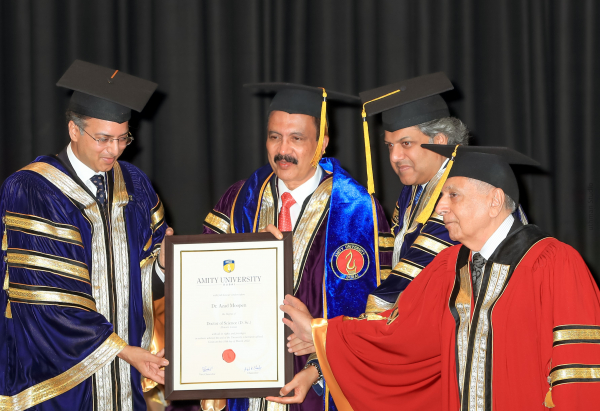 Dr. Azad Moopan honored with a doctorate by Amity University Charity for his work in Dubai